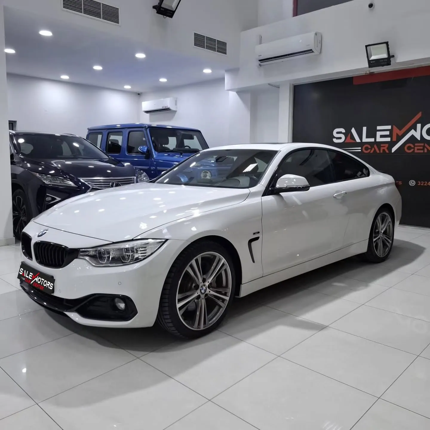 2014 BMW 435i Coupe, front three-quarter view