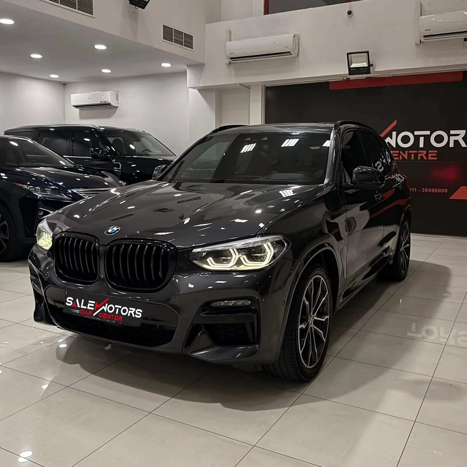 2020 BMW X3 M40i, front three-quarter view